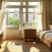 Traveler checking into a cozy boutique hotel room with luggage near a sunny window