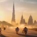 Dubai skyline at sunset with shaded summer activities and travelers near palm trees